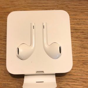 Never used iPhone charger  with head phone adaptor